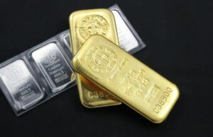 Gold surges past $5,000 for first time as silver tops $107 on safe-haven buying